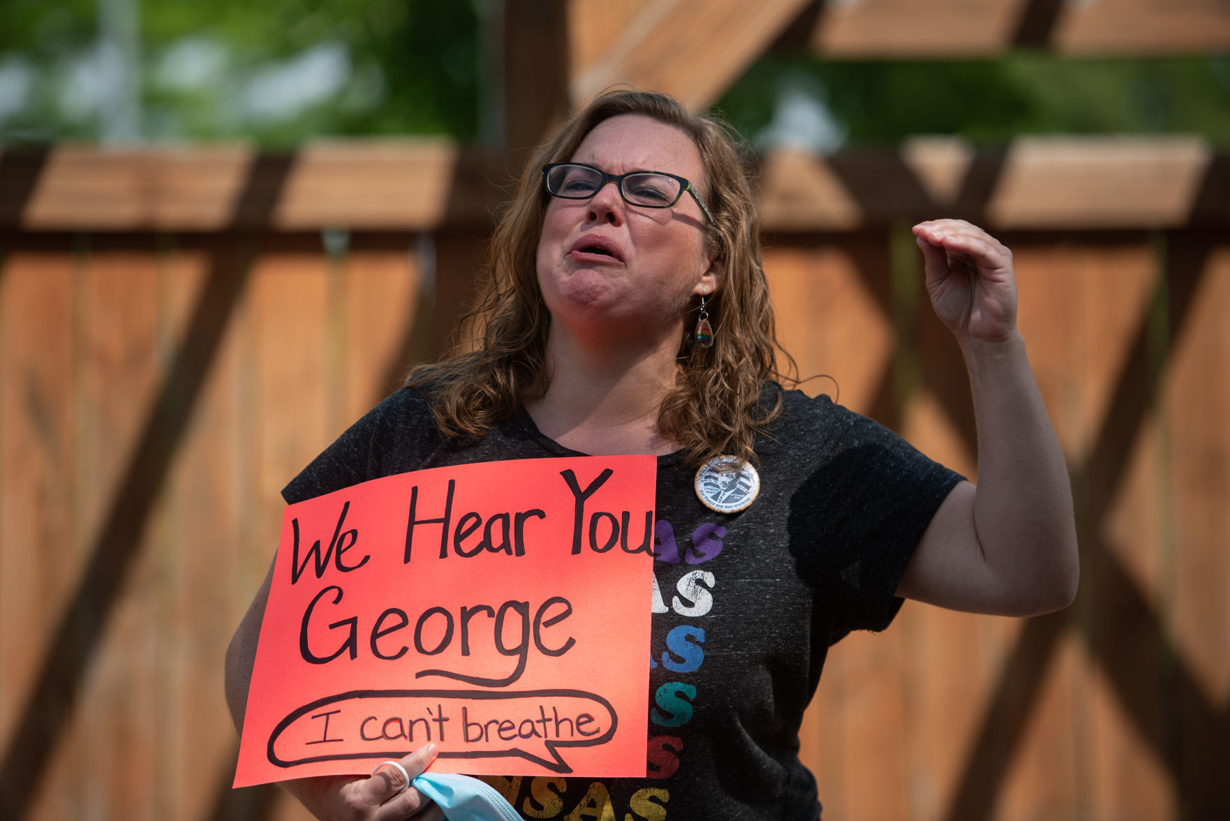 Rachel Shivers speaks at a peaceful protest in honor of George Floyd at Triangle Park on Saturday.